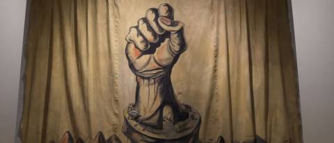Painting of a fist punching the air