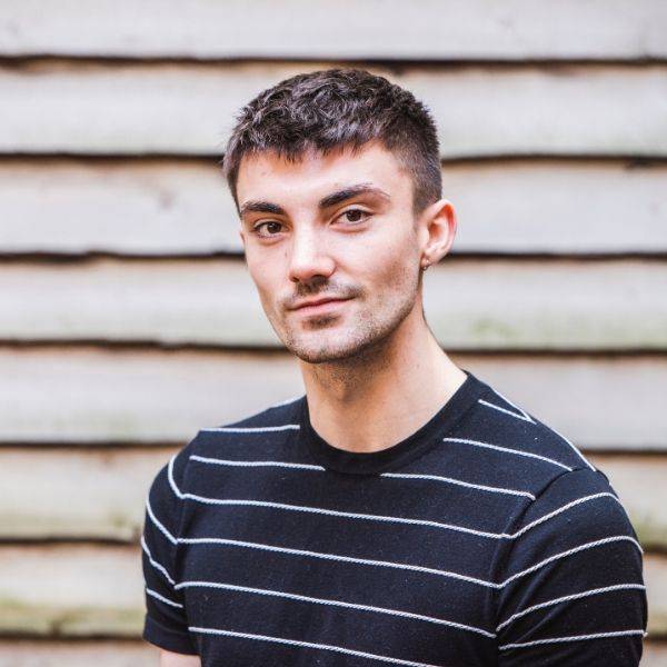 Joshua Attwood in striped t-shirt