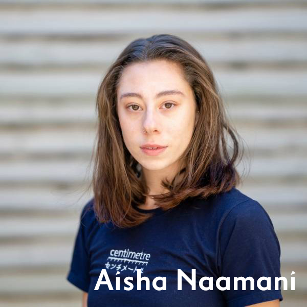 Aisha Naamani in a navy blue t shirt