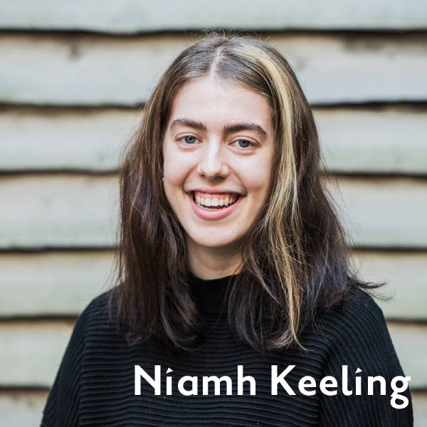 Niamh smiling in a black top