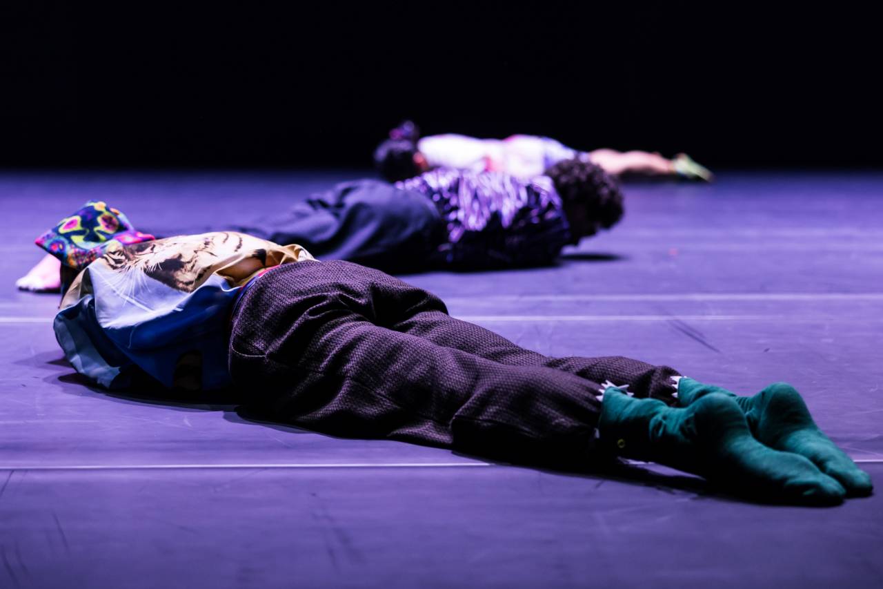 dancers lying on the floor