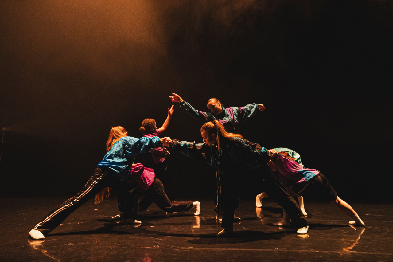 huge group of young dancers grooving together 