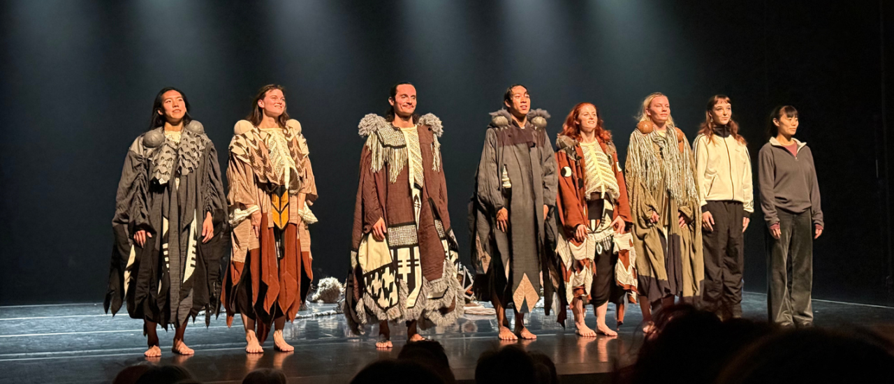 bows on stage after a performance