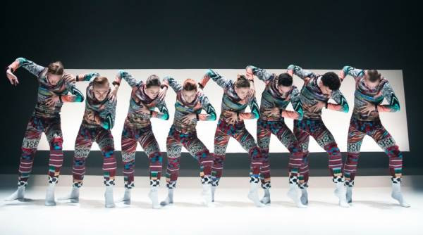 Tundra all dancers in a row with right arm in the air at a right angle